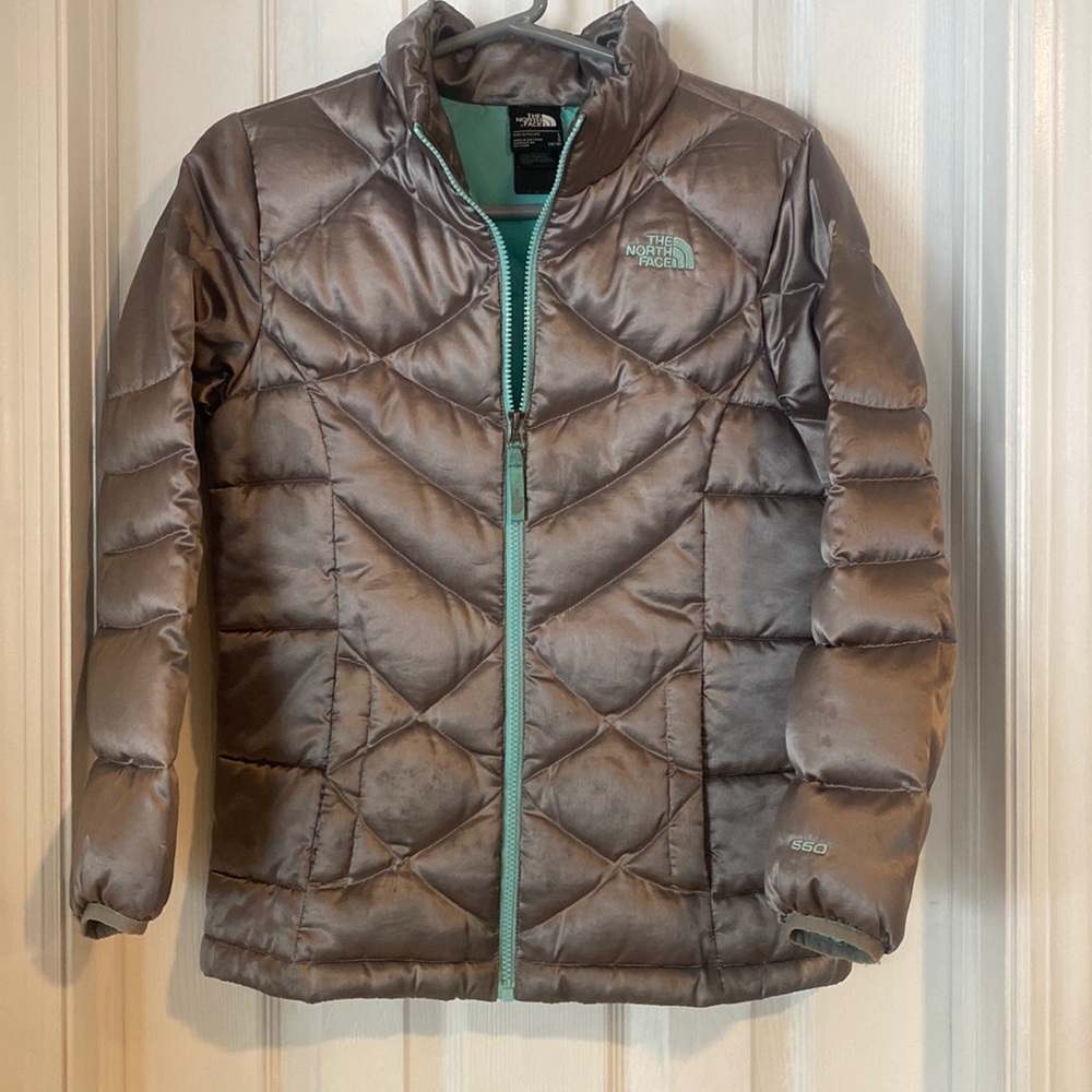 Kids The North Face grey jacket with teal inside.